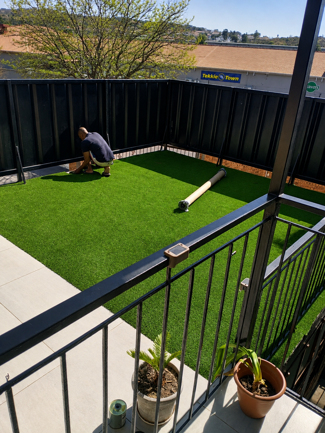 sunny balcony turf installation